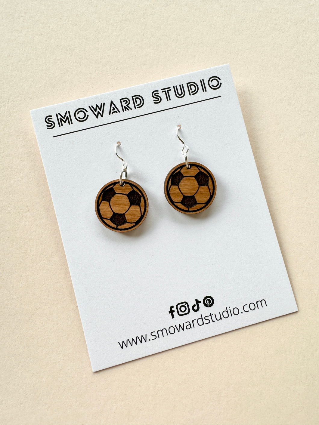 Dainty soccer balls on wood